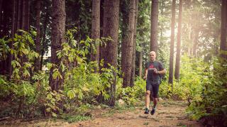 Photo of Malcolm Smillie running in Pacific Spirit Forest 