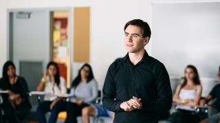 Photo of Michael Griffin in the classroom with students