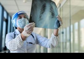 Researcher looking at x-ray