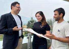 UBCO engineering Professor Dr. Mohammad Zarifi examines a prototype test blade with doctoral student Zahra Azim and lab manager Mandeep Jain
